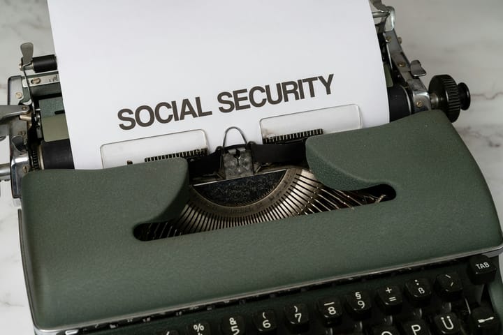 Picture of a typewriter with SOCIAL SECURITY on a piece of paper 